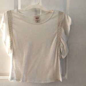 Off white top with lace trim, large cap sleeves